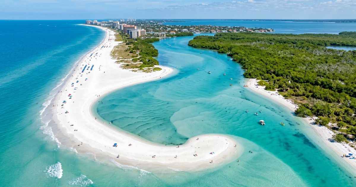 Aerial view of the white sand and tidal lagoon at Tigertail Beach in Marco Island.