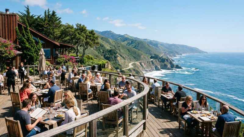 Outdoor dining terrace with ocean views at Nepenthe restaurant in Big Sur.