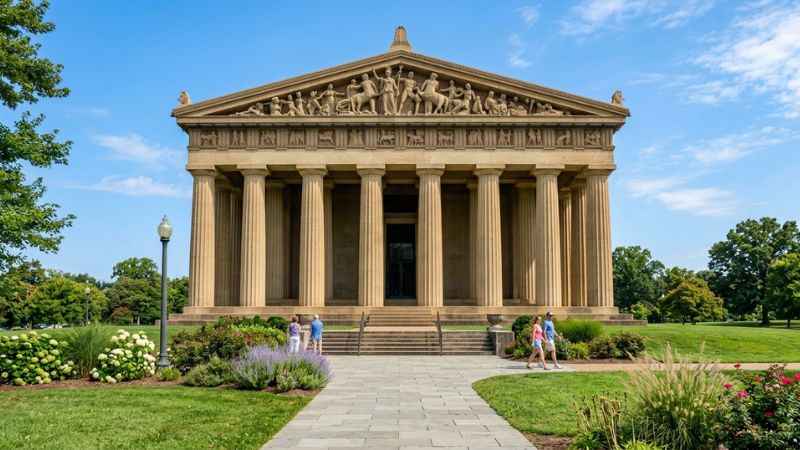 The Parthenon building surrounded by trees inside Centennial Park Nashville.