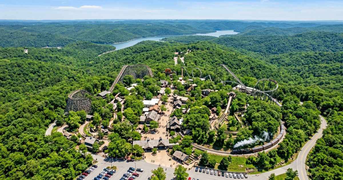 Aerial view of Silver Dollar City theme park nestled in the green Ozark Mountains in Branson.