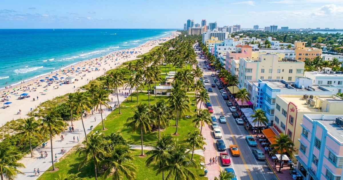 Outdoor view of Ocean Drive street and palm trees in South Beach Miami.
