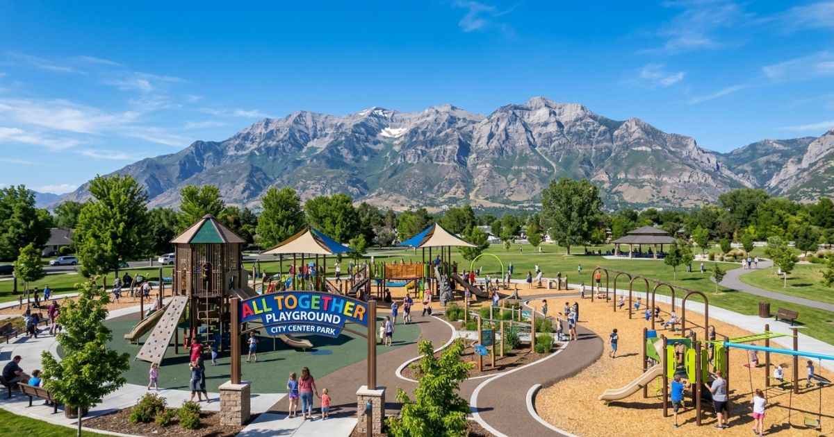 All Together Playground at City Center Park in Orem Utah with mountains in the background