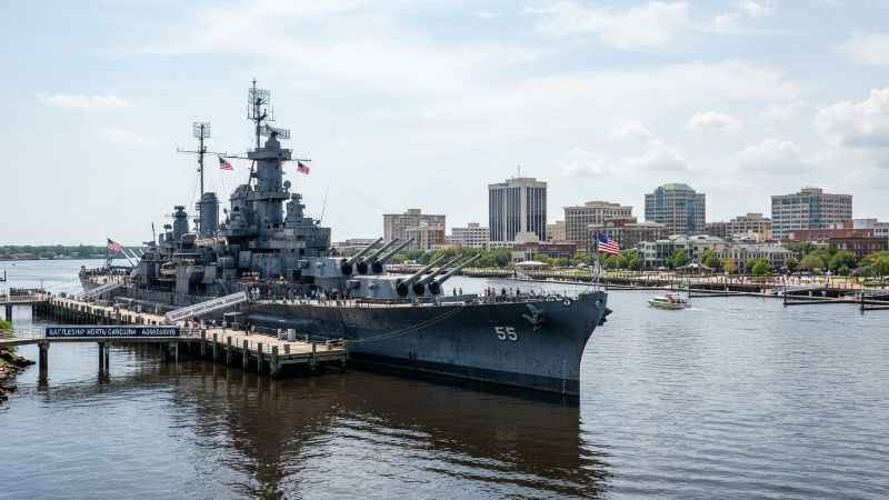 The historic Battleship North Carolina anchored on the Cape Fear River in Wilmington NC.