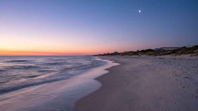 A peaceful coastal landscape at dusk in Mexico Beach, Florida.