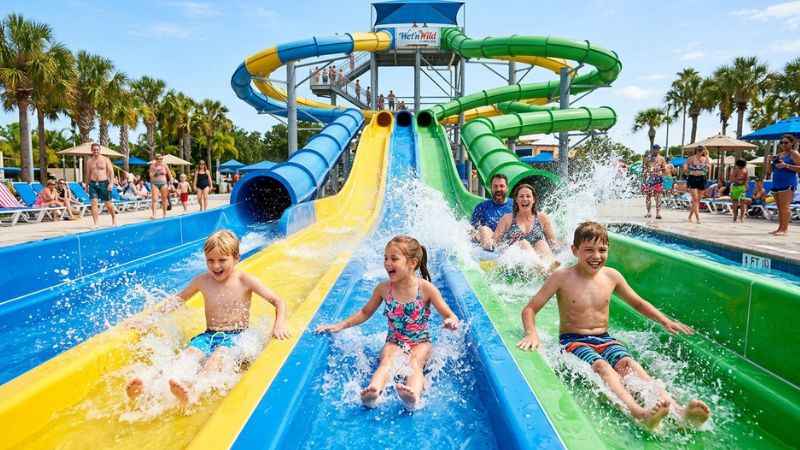 Families enjoying the water slides and pools at Sun Splash Family Waterpark in Cape Coral.